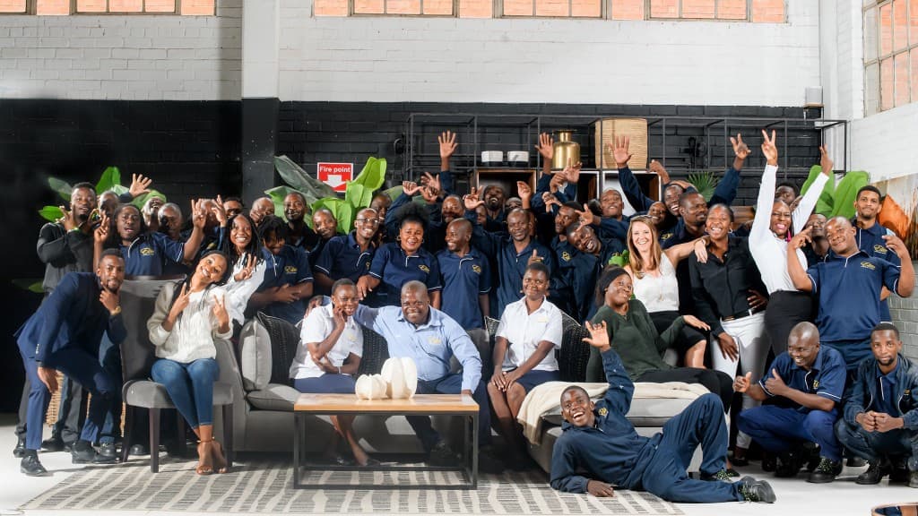 Elite Interiors team in the studio — group portrait.